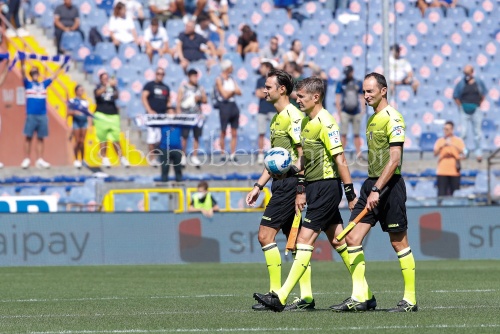 Daniele Orsato (referee) and assistants enter the field